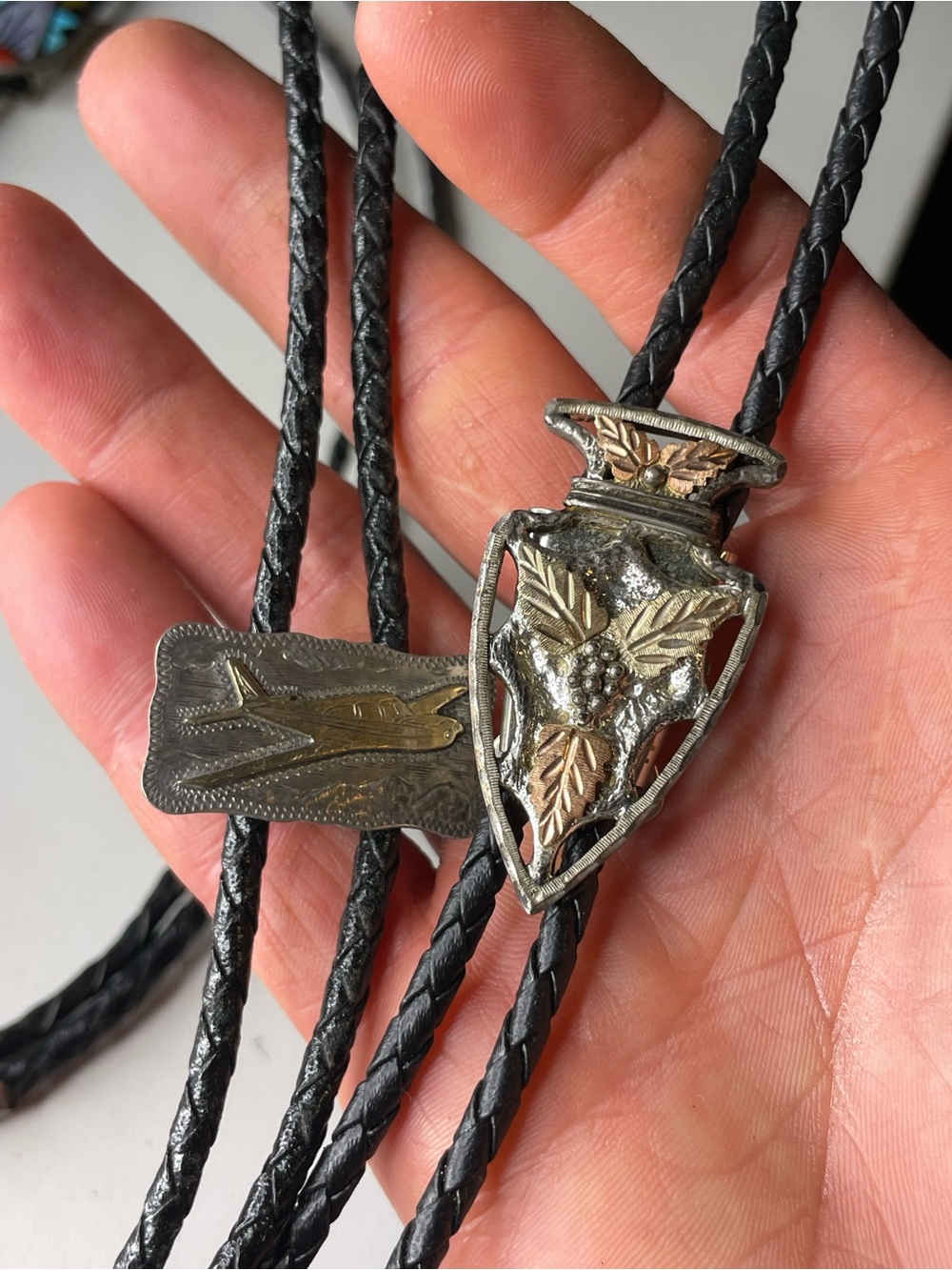 Massive sterling silver bolo tie lot, black Hills gold, airplane 10k, native
